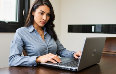 PornJoy woman typing on laptop